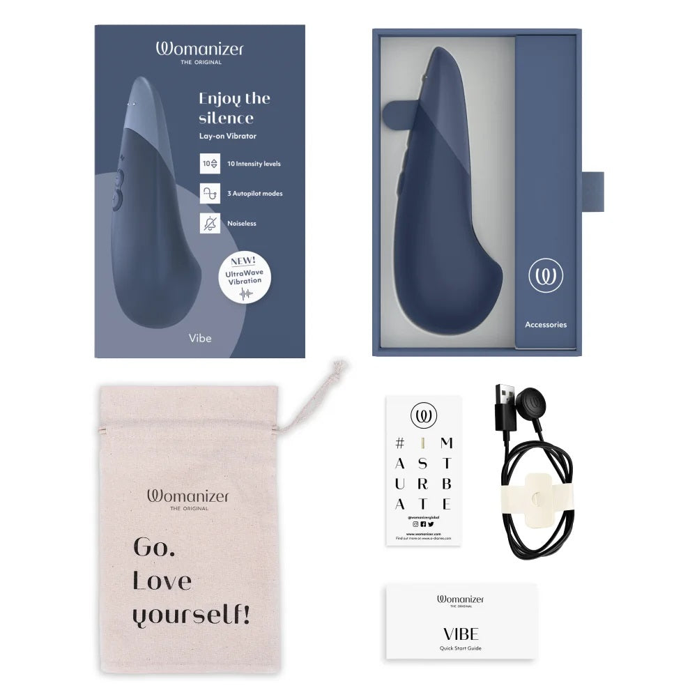 深藍色Womanizer Vibe UltraWave靜音振動陰蒂按摩器,手持設計與柔和振動效果