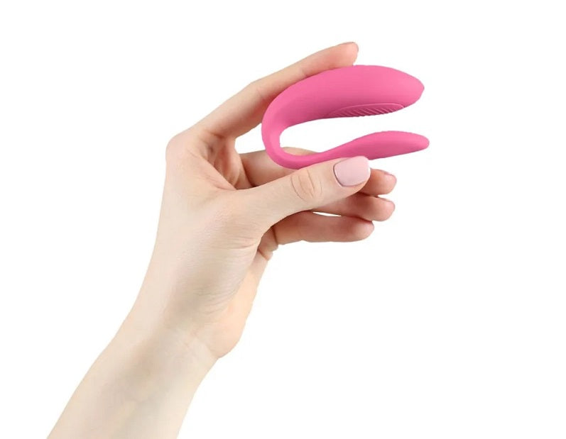 粉紅色We-Vibe Sync Lite情侶震動器，雙人使用的親密成人玩具，適合情趣娛樂場景