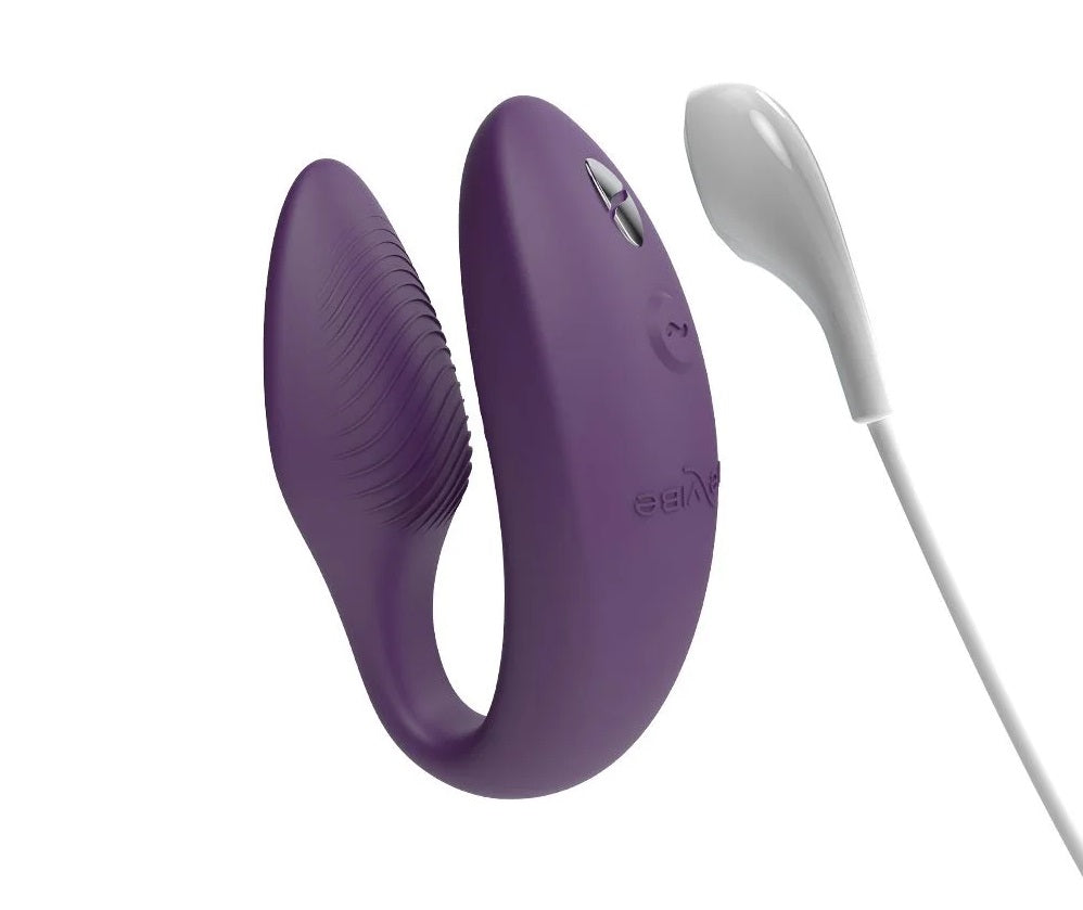 紫色We-Vibe Sync 2情侶共用震動器，雙人振動情趣用品，適合親密時刻使用。