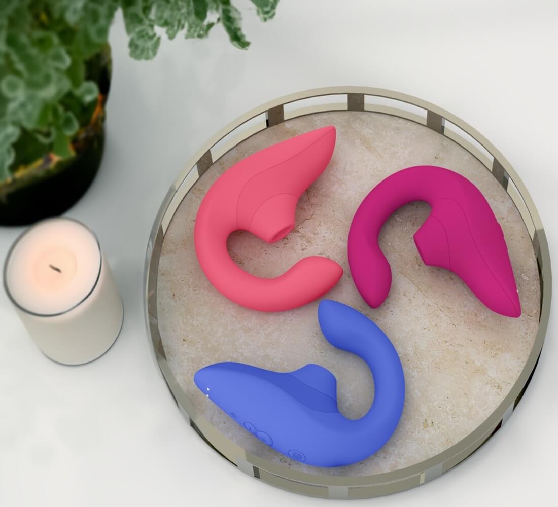 粉蓝色Womanizer Blend阴蒂吸啜与G点按摩器，18funstore品牌，展示产品的外观和设计细节