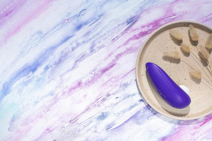 靛藍色Womanizer Starlet 3入門級陰蒂吸啜器，緩慢振動設計，女性性玩具，便攜式小巧外觀