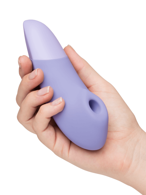 紫色Womanizer增强版Pleasure Air和深層震動陰蒂刺激器，女性情趣用品，舒適設計。